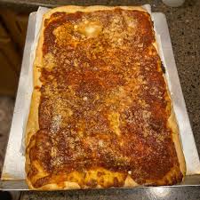 O’scugnizzo signature dishes Upside-Down PizzaPepperoni PizzaSausage Pizza